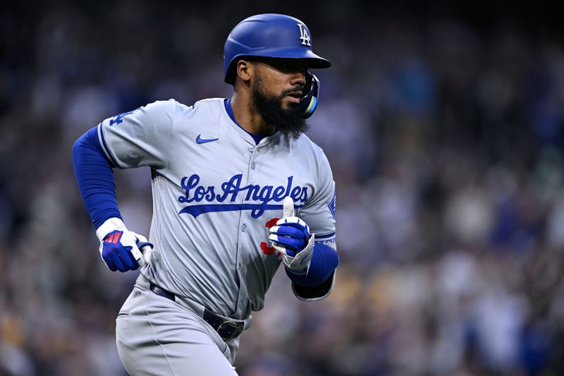 May 11, 2024; San Diego, California, USA; Los Angeles Dodgers left fielder Teoscar Hernandez (37) rounds the bases after hitting a grand slam home run during the sixth inning against the San Diego Padres at Petco Park. Mandatory Credit: Orlando Ramirez-USA TODAY Sports