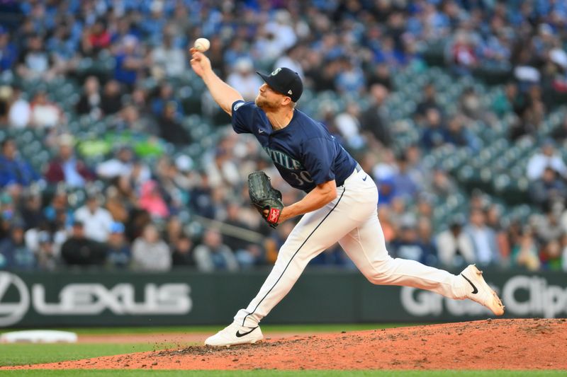 Jun 12, 2024; Seattle, Washington, USA; Seattle Mariners relief pitcher Austin Voth (30) pitches to the Chicago White Sox during the eighth inning at T-Mobile Park. Mandatory Credit: Steven Bisig-USA TODAY Sports