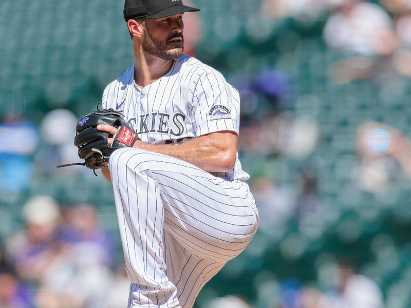 Jun 5, 2024; Denver, Colorado, USA; Colorado Rockies relief pitcher Tyler Kinley (40) delivers a pitch during the eighth inning against the Cincinnati Reds at Coors Field. Mandatory Credit: Andrew Wevers-USA TODAY Sports