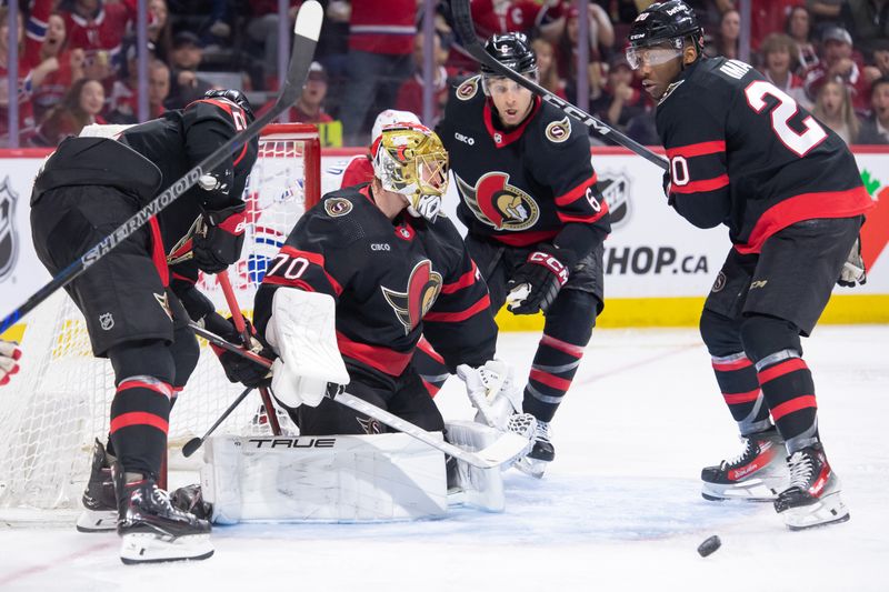 Apr 13, 2024; Ottawa, Ontario, CAN; Ottawa Senators defenseman Jakob Chychrun (6) moves the puck following a save by goalie Joonas Korpisalo (70) in the second period against the Montreal Canadiens at the Canadian Tire Centre. Mandatory Credit: Marc DesRosiers-USA TODAY Sports