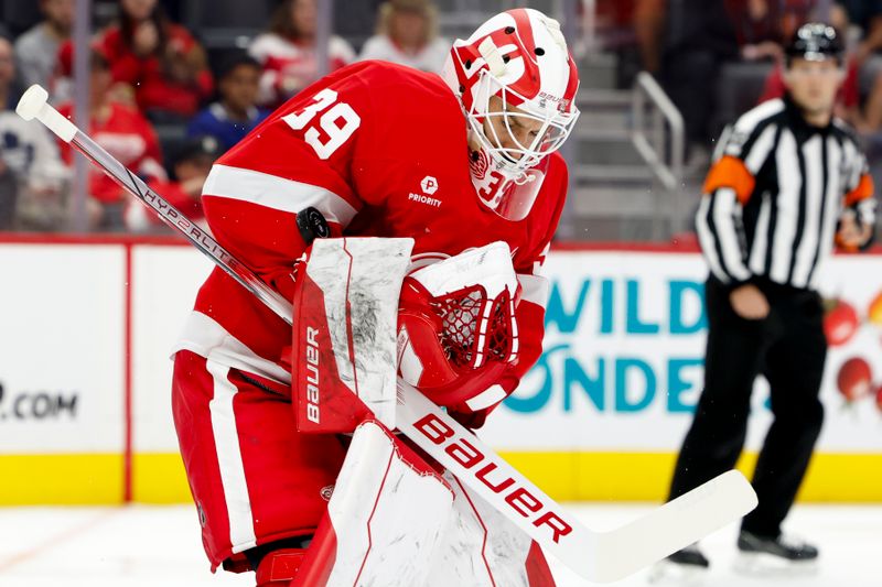 Oct 3, 2024; Detroit, Michigan, USA; Detroit Red Wings goaltender Cam Talbot (39) makes a save in the first period against the Toronto Maple Leafs at Little Caesars Arena. Mandatory Credit: Rick Osentoski-Imagn Images