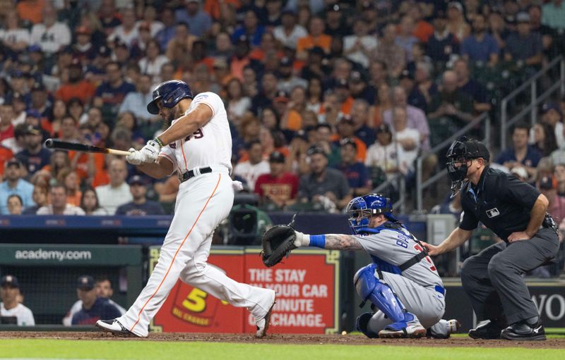 May 16, 2023; Houston, Texas, USA; Houston Astros first baseman Jose Abreu (79) hits a RBI double against the Chicago Cubs in the fourth inning at Minute Maid Park. Mandatory Credit: Thomas Shea-USA TODAY Sports