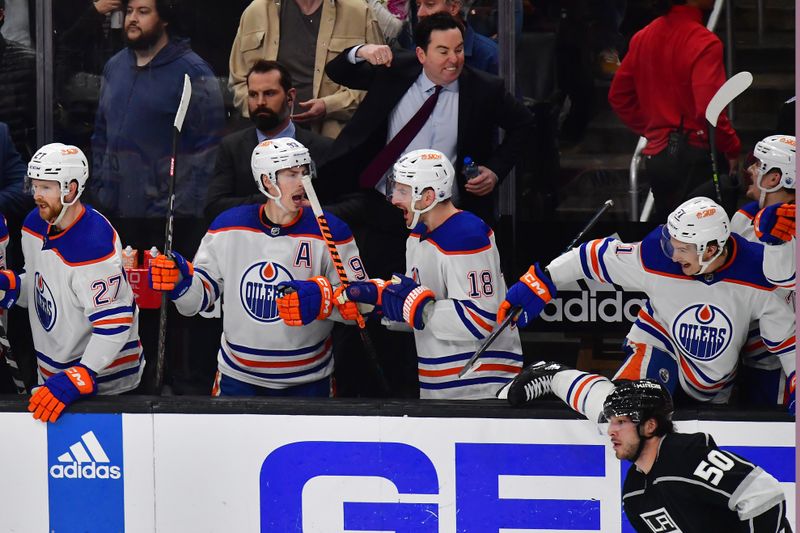 Apr 29, 2023; Los Angeles, California, USA; Edmonton Oilers head coach Jay Woodcroft and the bench celebrate the victory against the Los Angeles Kings in game six of the first round of the 2023 Stanley Cup Playoffs at Crypto.com Arena. Mandatory Credit: Gary A. Vasquez-USA TODAY Sports