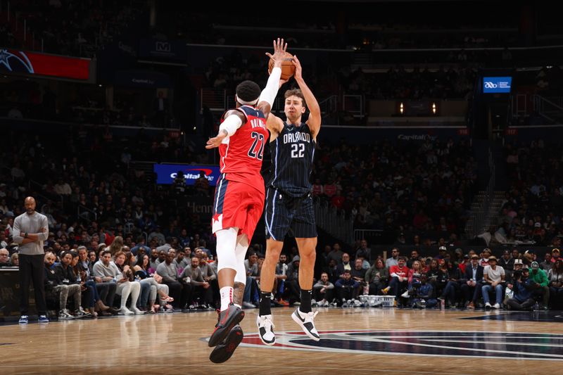 WASHINGTON, DC -? MARCH 6:  Franz Wagner #22 of the Orlando Magic shoots a 3-point basket during the game  on March 6, 2024 at Capital One Arena in Washington, DC. NOTE TO USER: User expressly acknowledges and agrees that, by downloading and or using this Photograph, user is consenting to the terms and conditions of the Getty Images License Agreement. Mandatory Copyright Notice: Copyright 2024 NBAE (Photo by Stephen Gosling/NBAE via Getty Images)