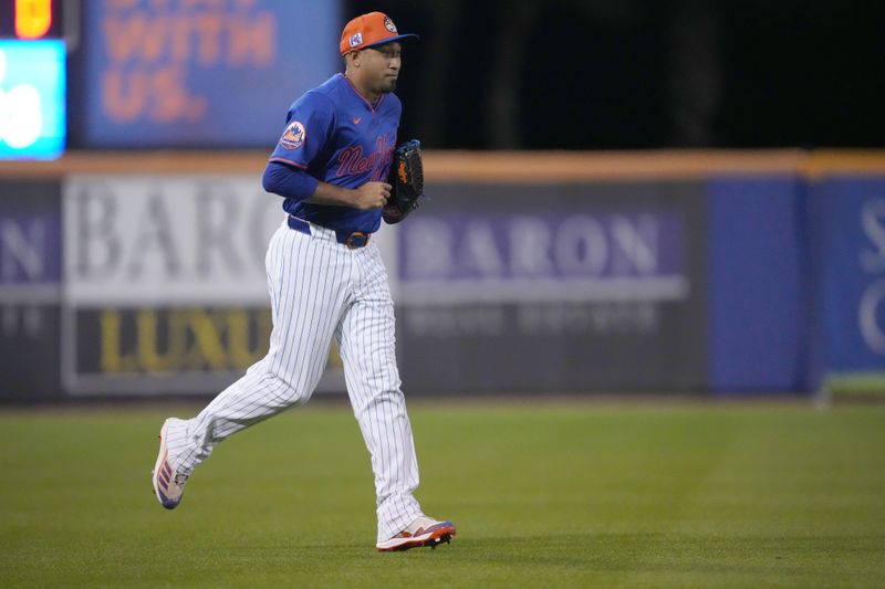 Mar 6, 2025; Port St. Lucie, Florida, USA;  New York Mets pitcher Edwin Díaz (39) enters the game in the fourth inning against the Houston Astros at Clover Park. Mandatory Credit: Jim Rassol-Imagn Images