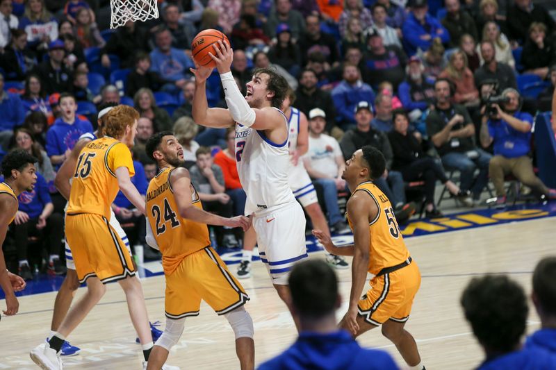 Feb 11, 2023; Boise, Idaho, USA; Boise State Broncos forward Tyson Degenhart (2) puts back a rebound during the second half against the Wyoming Cowboys at ExtraMile Arena. Boise State beats Wyoming 75-63. Mandatory Credit: Brian Losness-USA TODAY Sports

