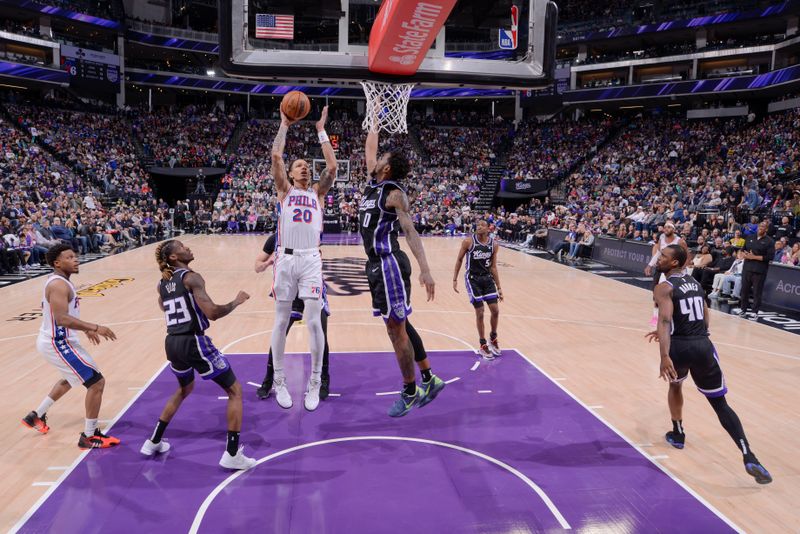 SACRAMENTO, CA - MARCH 25:  D.J. Wilson #20 of the Philadelphia 76ers goes to the basket during the game on March 25, 2024 at Golden 1 Center in Sacramento, California. NOTE TO USER: User expressly acknowledges and agrees that, by downloading and or using this Photograph, user is consenting to the terms and conditions of the Getty Images License Agreement. Mandatory Copyright Notice: Copyright 2024 NBAE (Photo by Rocky Widner/NBAE via Getty Images)