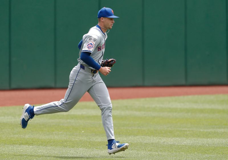 Jul 8, 2024; Pittsburgh, Pennsylvania, USA;  New York Mets relief pitcher Eric Orze (53) runs in from the bullpen to make his major league debut during the sixth inning against the Pittsburgh Pirates at PNC Park.  The Pirates won 8-2. Mandatory Credit: Charles LeClaire-USA TODAY Sports