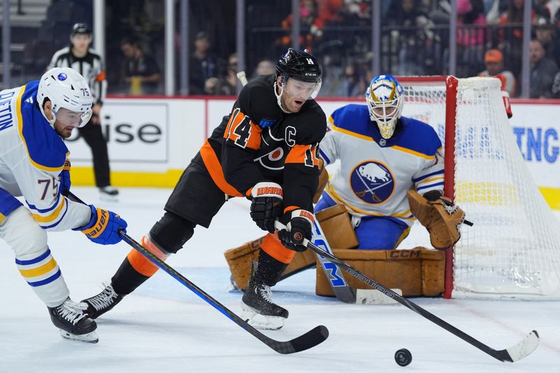 Nov 16, 2024; Philadelphia, Pennsylvania, USA; Philadelphia Flyers center Sean Couturier (14) reaches for the puck against Buffalo Sabres defenseman Connor Clifton (75) in the third period at Wells Fargo Center. Mandatory Credit: Kyle Ross-Imagn Images