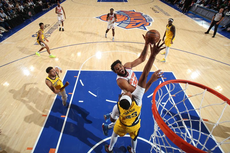 NEW YORK, NY - OCTOBER 25: Karl-Anthony Towns #32 of the New York Knicks drives to the basket during the game against the Indiana Pacers on October 25, 2024 at Madison Square Garden in New York City, New York.  NOTE TO USER: User expressly acknowledges and agrees that, by downloading and or using this photograph, User is consenting to the terms and conditions of the Getty Images License Agreement. Mandatory Copyright Notice: Copyright 2024 NBAE  (Photo by David L. Nemec/NBAE via Getty Images)