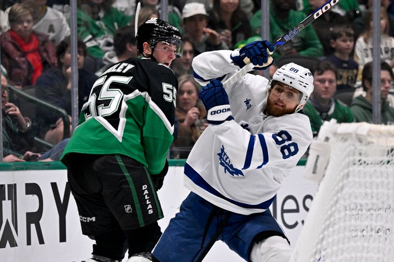 Dec 21, 2025; Dallas, Texas, USA; Dallas Stars defenseman Thomas Harley (55) and Toronto Maple Leafs right wing William Nylander (88) chase the puck during the first period at the American Airlines Center. Mandatory Credit: Jerome Miron-Imagn Images
