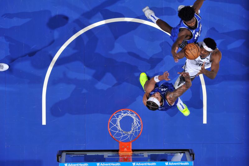 ORLANDO, FL - MARCH 13: Day'Ron Sharpe #20 of the Brooklyn Nets drives to the basket during the game against the Orlando Magic on March 13, 2024 at the Kia Center in Orlando, Florida. NOTE TO USER: User expressly acknowledges and agrees that, by downloading and or using this photograph, User is consenting to the terms and conditions of the Getty Images License Agreement. Mandatory Copyright Notice: Copyright 2024 NBAE (Photo by Fernando Medina/NBAE via Getty Images)