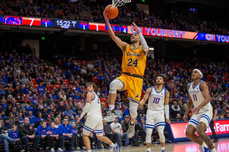 Feb 11, 2023; Boise, Idaho, USA; Wyoming Cowboys guard Hunter Maldonado (24) drives during the first half against the Boise State Broncos at ExtraMile Arena. Mandatory Credit: Brian Losness-USA TODAY Sports
ports