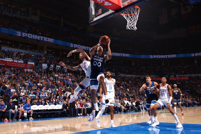 OKLAHOMA CITY, OK - FEBRUARY 24:  Terrence Shannon Jr. #00 of the Minnesota Timberwolves drives to the basket during the game against the Oklahoma City Thunder on February 24, 2025 at Paycom Center in Oklahoma City, Oklahoma. NOTE TO USER: User expressly acknowledges and agrees that, by downloading and or using this photograph, User is consenting to the terms and conditions of the Getty Images License Agreement. Mandatory Copyright Notice: Copyright 2025 NBAE (Photo by Zach Beeker/NBAE via Getty Images)