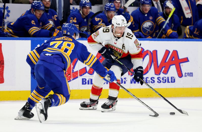 Feb 15, 2024; Buffalo, New York, USA;  Buffalo Sabres defenseman Jacob Bryson (78) defends as Florida Panthers left wing Matthew Tkachuk (19) skates with the puck during the first period at KeyBank Center. Mandatory Credit: Timothy T. Ludwig-USA TODAY Sports