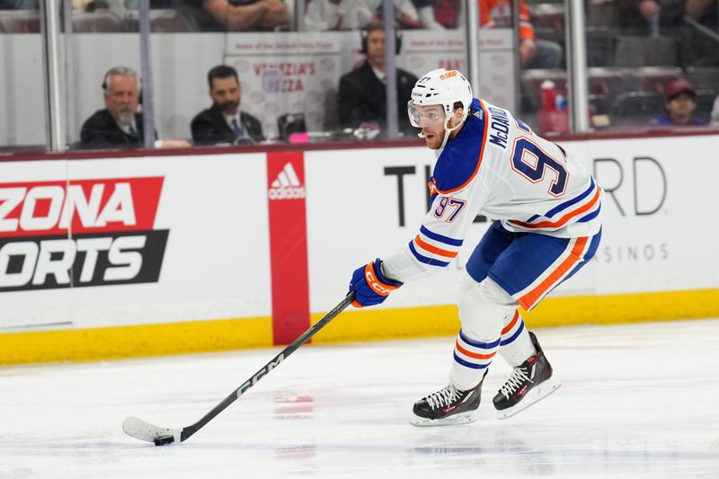 Feb 19, 2024; Tempe, Arizona, USA; Edmonton Oilers center Connor McDavid (97) skates against the Arizona Coyotes during the second period at Mullett Arena. Mandatory Credit: Joe Camporeale-USA TODAY Sports