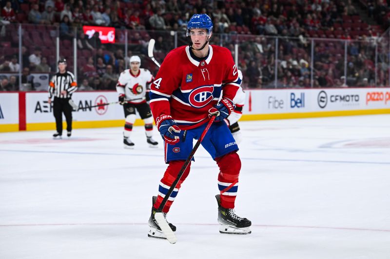 Oct 1, 2024; Montreal, Quebec, CAN; Montreal Canadiens defenseman Logan Mailloux (24) tracks the play against the Ottawa Senators during the third period at Bell Centre. Mandatory Credit: David Kirouac-Imagn Images