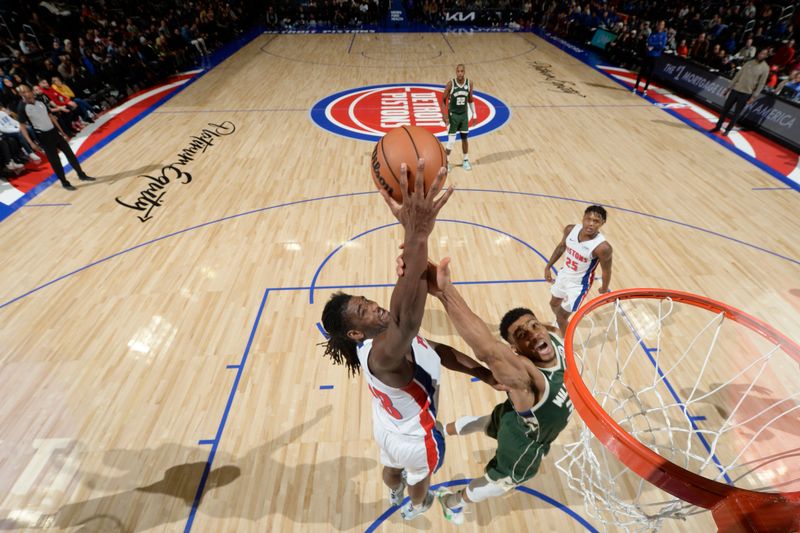 DETROIT, MI - JANUARY 22: Isaiah Stewart #28 of the Detroit Pistons grabs a rebound during the game against the Milwaukee Bucks on January 22, 2024 at Little Caesars Arena in Detroit, Michigan. NOTE TO USER: User expressly acknowledges and agrees that, by downloading and/or using this photograph, User is consenting to the terms and conditions of the Getty Images License Agreement. Mandatory Copyright Notice: Copyright 2024 NBAE (Photo by Chris Schwegler/NBAE via Getty Images)