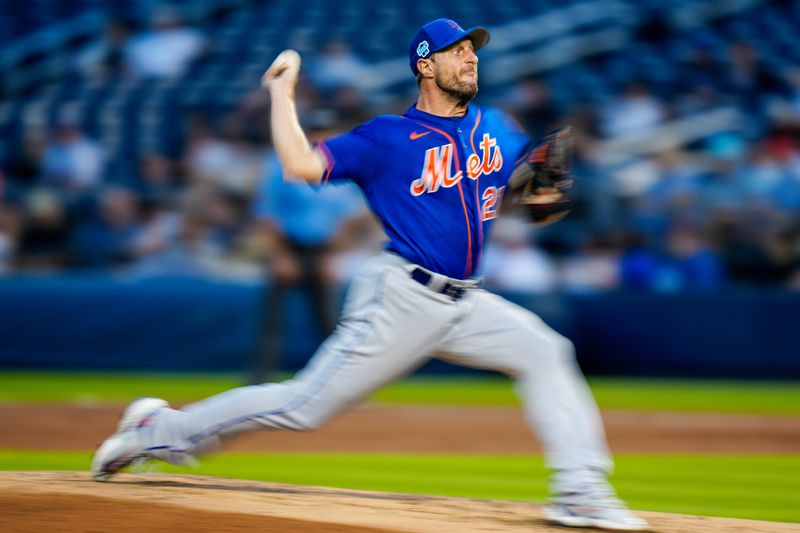 Mar 18, 2023; West Palm Beach, Florida, USA; New York Mets starting pitcher Max Scherzer (21) throws a pitch against the Houston Astros during the third inning at The Ballpark of the Palm Beaches. Mandatory Credit: Rich Storry-USA TODAY Sports