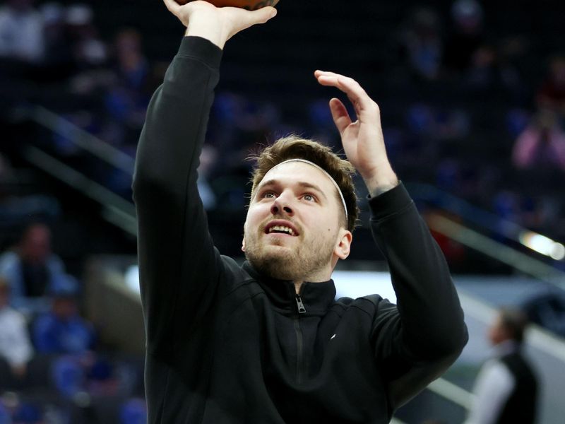 DALLAS, TEXAS - DECEMBER 27: Luka Doncic #77 of the Dallas Mavericks shoots the ball during warmups before the game against the Cleveland Cavaliers at American Airlines Center on December 27, 2023 in Dallas, Texas. NOTE TO USER: User expressly acknowledges and agrees that, by downloading and or using this photograph, User is consenting to the terms and conditions of the Getty Images License Agreement. (Photo by Tim Heitman/Getty Images)