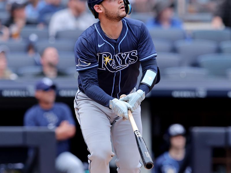 Jul 20, 2024; Bronx, New York, USA; Tampa Bay Rays catcher Alex Jackson (28) watches his three run home run against the New York Yankees during the fourth inning at Yankee Stadium. Mandatory Credit: Brad Penner-USA TODAY Sports