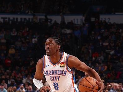 OKLAHOMA CITY, OK - DECEMBER 18: Jalen Williams #8 of the Oklahoma City Thunder handles the ball during the game against the Memphis Grizzlies  on December 18, 2023 at Paycom Arena in Oklahoma City, Oklahoma. NOTE TO USER: User expressly acknowledges and agrees that, by downloading and or using this photograph, User is consenting to the terms and conditions of the Getty Images License Agreement. Mandatory Copyright Notice: Copyright 2023 NBAE (Photo by Zach Beeker/NBAE via Getty Images)