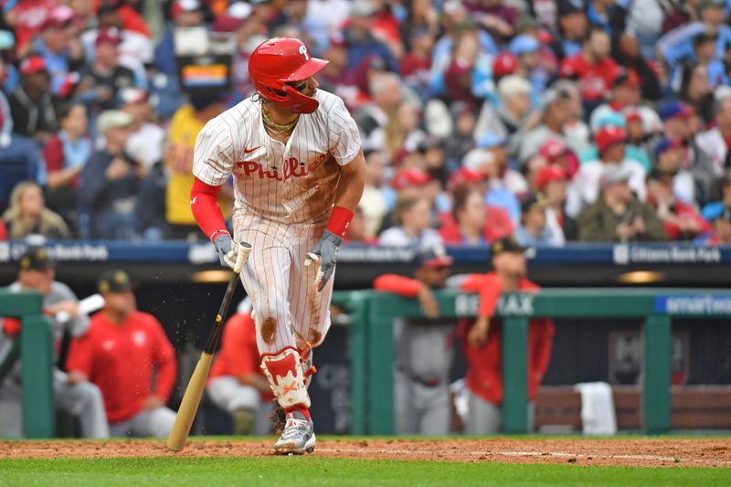 May 19, 2024; Philadelphia, Pennsylvania, USA; Philadelphia Phillies first base Bryce Harper (3) hits a single during the fourth inning against the Washington Nationals at Citizens Bank Park. Mandatory Credit: Eric Hartline-USA TODAY Sports