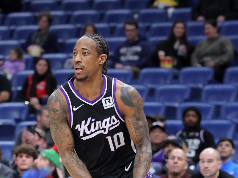 NEW ORLEANS, LOUISIANA - DECEMBER 12: DeMar DeRozan #10 of the Sacramento Kings drives with the ball against the New Orleans Pelicans during a game at the Smoothie King Center on December 12, 2024 in New Orleans, Louisiana. NOTE TO USER: User expressly acknowledges and agrees that, by downloading and or using this Photograph, user is consenting to the terms and conditions of the Getty Images License Agreement. (Photo by Jonathan Bachman/Getty Images)