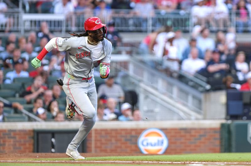 May 6, 2025; Cumberland, Georgia, USA; Cincinnati Reds shortstop Elly De La Cruz (44) runs to first base for a single against the Atlanta Braves during the second inning at Truist Park. Mandatory Credit: Jordan Godfree-Imagn Images