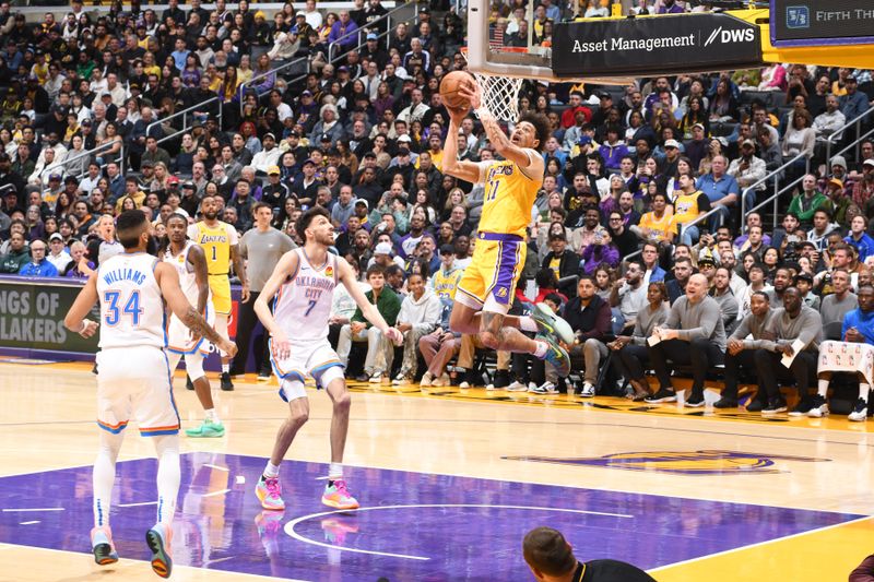 LOS ANGELES, CA - MARCH 4: Jaxson Hayes #11 of the Los Angeles Lakers drives to the basket during the game against the Oklahoma City Thunder on March 4, 2024 at Crypto.Com Arena in Los Angeles, California. NOTE TO USER: User expressly acknowledges and agrees that, by downloading and/or using this Photograph, user is consenting to the terms and conditions of the Getty Images License Agreement. Mandatory Copyright Notice: Copyright 2024 NBAE (Photo by Andrew D. Bernstein/NBAE via Getty Images)