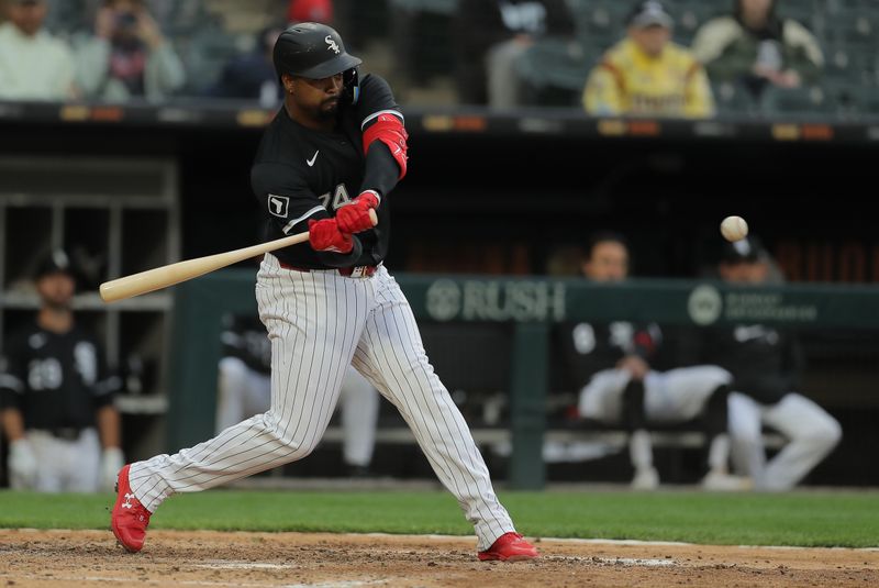 Apr 17, 2024; Chicago, Illinois, USA; Chicago White Sox designated hitter Eloy Jimenez (74) flies out in the sixth inning during game two of a double header against the Kansas City Royals at Guaranteed Rate Field. Mandatory Credit: Melissa Tamez-USA TODAY Sports