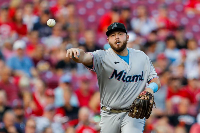 Aug 8, 2023; Cincinnati, Ohio, USA; Miami Marlins third baseman Jake Burger (36) throws to first to get Cincinnati Reds third baseman Nick Senzel (not pictured) out in the first inning at Great American Ball Park. Mandatory Credit: Katie Stratman-USA TODAY Sports