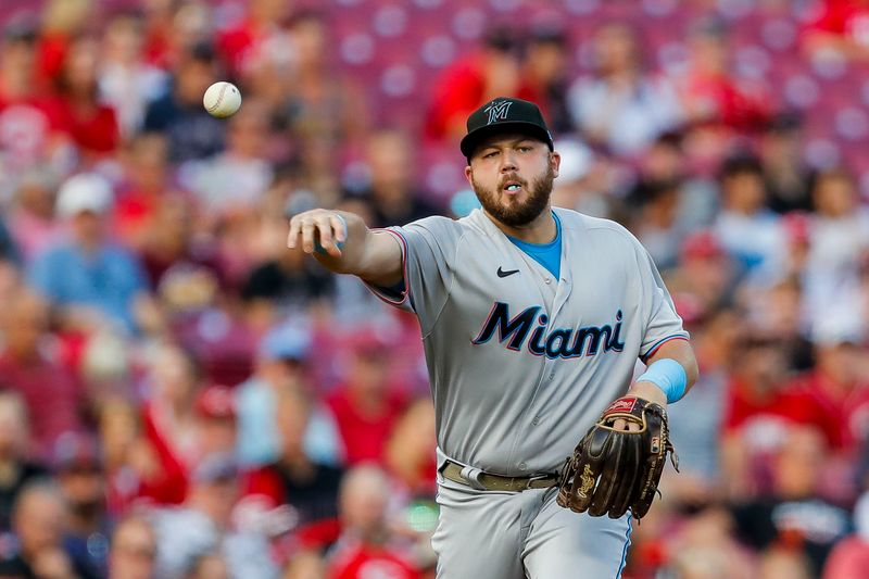 Aug 8, 2023; Cincinnati, Ohio, USA; Miami Marlins third baseman Jake Burger (36) throws to first to get Cincinnati Reds third baseman Nick Senzel (not pictured) out in the first inning at Great American Ball Park. Mandatory Credit: Katie Stratman-USA TODAY Sports