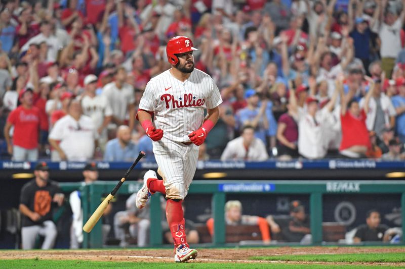 Aug 21, 2023; Philadelphia, Pennsylvania, USA; Philadelphia Phillies left fielder Kyle Schwarber (12) drops his bat after hitting a two-run home run against the San Francisco Giants during the seventh inning at Citizens Bank Park. Mandatory Credit: Eric Hartline-USA TODAY Sports