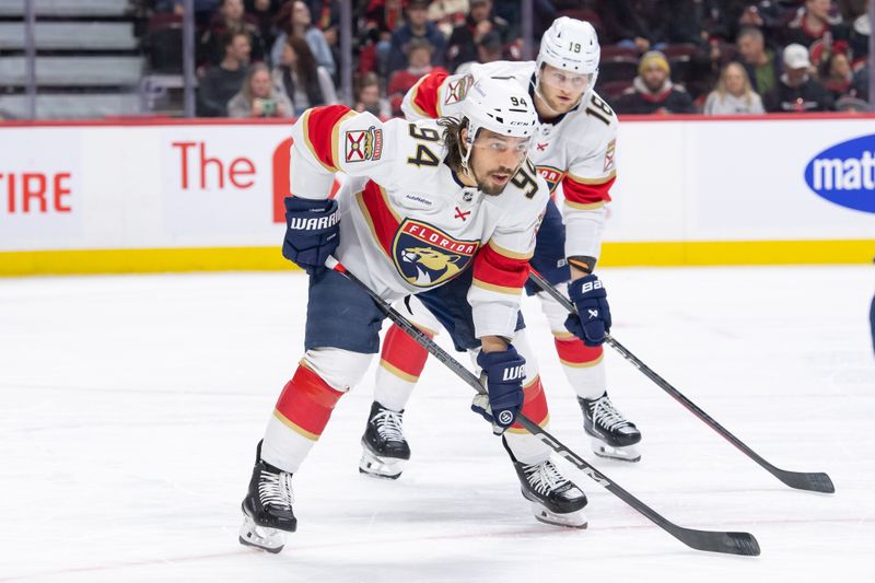 Apr 4, 2024; Ottawa, Ontario, CAN; Florida Panthers POS PLAYER left wing Ryan Lomberg (94) and center Steven Lorenz (18) line up for a faceoff in the first period against the Ottawa Senators at the Canadian Tire Centre. Mandatory Credit: Marc DesRosiers-USA TODAY Sports