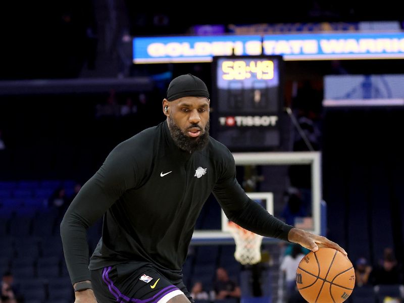 SAN FRANCISCO, CALIFORNIA - OCTOBER 18: LeBron James #23 of the Los Angeles Lakers warms up before their preseason game against the Golden State Warriors at Chase Center on October 18, 2024 in San Francisco, California.  NOTE TO USER: User expressly acknowledges and agrees that, by downloading and/or using this photograph, user is consenting to the terms and conditions of the Getty Images License Agreement.  (Photo by Ezra Shaw/Getty Images)