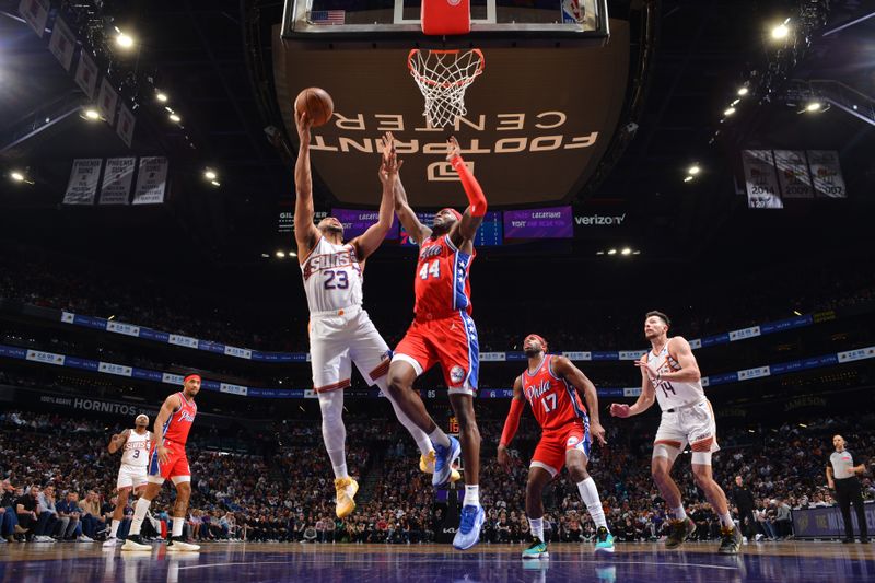 PHOENIX, AZ - MARCH 20:  Eric Gordon #23 of the Phoenix Suns drives to the basket during the game against the Philadelphia 76ers on March 20, 2024 at Footprint Center in Phoenix, Arizona. NOTE TO USER: User expressly acknowledges and agrees that, by downloading and or using this photograph, user is consenting to the terms and conditions of the Getty Images License Agreement. Mandatory Copyright Notice: Copyright 2024 NBAE (Photo by Barry Gossage/NBAE via Getty Images)