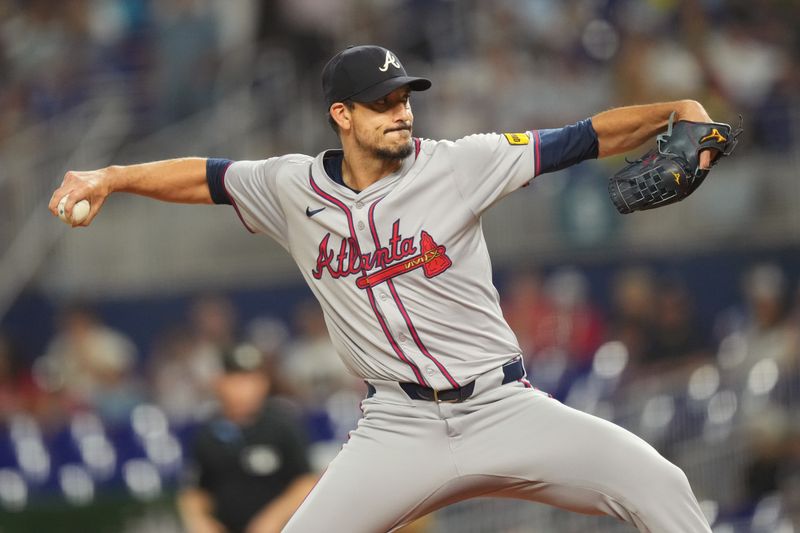 Sep 20, 2024; Miami, Florida, USA;  Atlanta Braves pitcher Charlie Morton (50) pitches in the first inning against the Miami Marlins at loanDepot Park. Mandatory Credit: Jim Rassol-Imagn Images