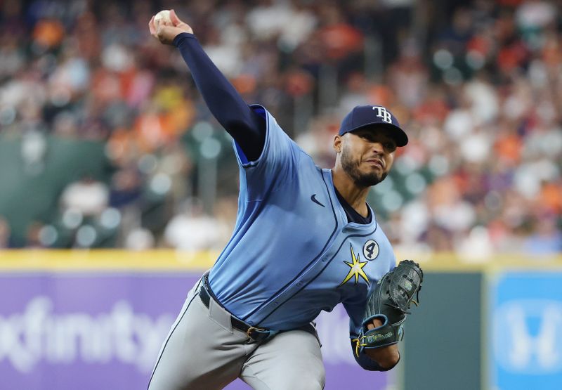 Jun 1, 2025; Houston, Texas, USA; Tampa Bay Rays starting pitcher Taj Bradley (45) pitches against the Houston Astros in the first inning at Daikin Park. Mandatory Credit: Thomas Shea-Imagn Images