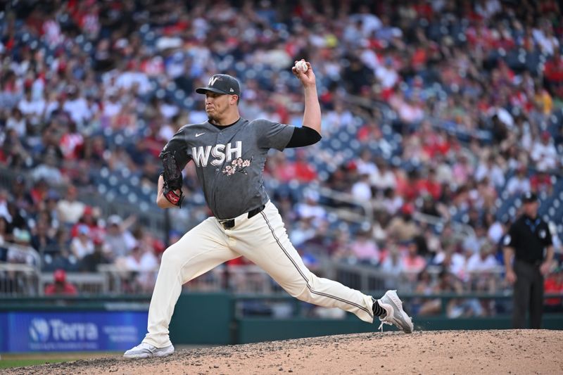 Jun 8, 2024; Washington, District of Columbia, USA; Washington Nationals relief pitcher Robert Garcia (61) throws a pitch against the Atlanta Braves during the ninth inning at Nationals Park. Mandatory Credit: Rafael Suanes-USA TODAY Sports