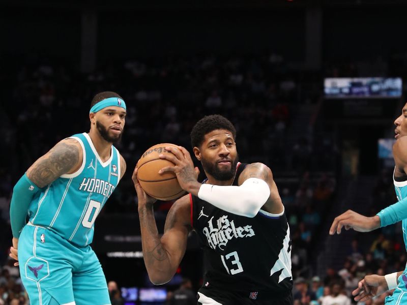 CHARLOTTE, NC - MARCH 31: Paul George #13 of the LA Clippers drives to the basket during the game against the Charlotte Hornets on March 31, 2024 at Spectrum Center in Charlotte, North Carolina. NOTE TO USER: User expressly acknowledges and agrees that, by downloading and or using this photograph, User is consenting to the terms and conditions of the Getty Images License Agreement.  Mandatory Copyright Notice:  Copyright 2024 NBAE (Photo by Brock Williams-Smith/NBAE via Getty Images)