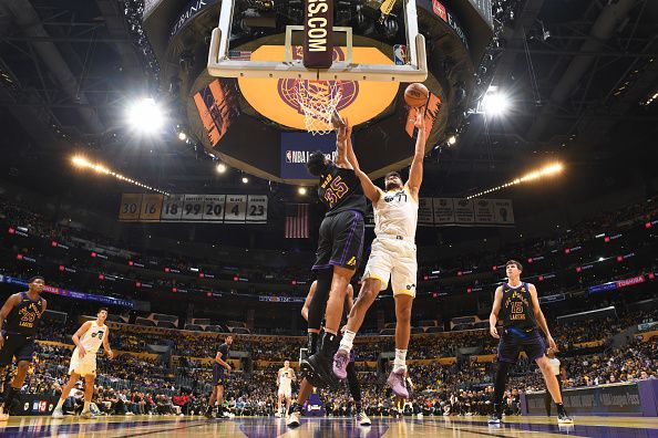 LOS ANGELES, CA - NOVEMBER 21:  Omer Yurtseven #77 of the Utah Jazz goes to the basket during the game during the in Season Tournament on November 21, 2023 at Crypto.Com Arena in Los Angeles, California. NOTE TO USER: User expressly acknowledges and agrees that, by downloading and/or using this Photograph, user is consenting to the terms and conditions of the Getty Images License Agreement. Mandatory Copyright Notice: Copyright 2023 NBAE (Photo by Adam Pantozzi/NBAE via Getty Images)