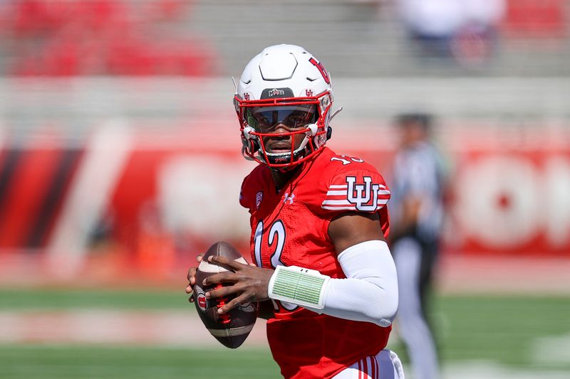 Sep 23, 2023; Salt Lake City, Utah, USA; Utah Utes quarterback Nate Johnson (13) warms up before a game against the UCLA Bruins at Rice-Eccles Stadium. Mandatory Credit: Rob Gray-USA TODAY Sports