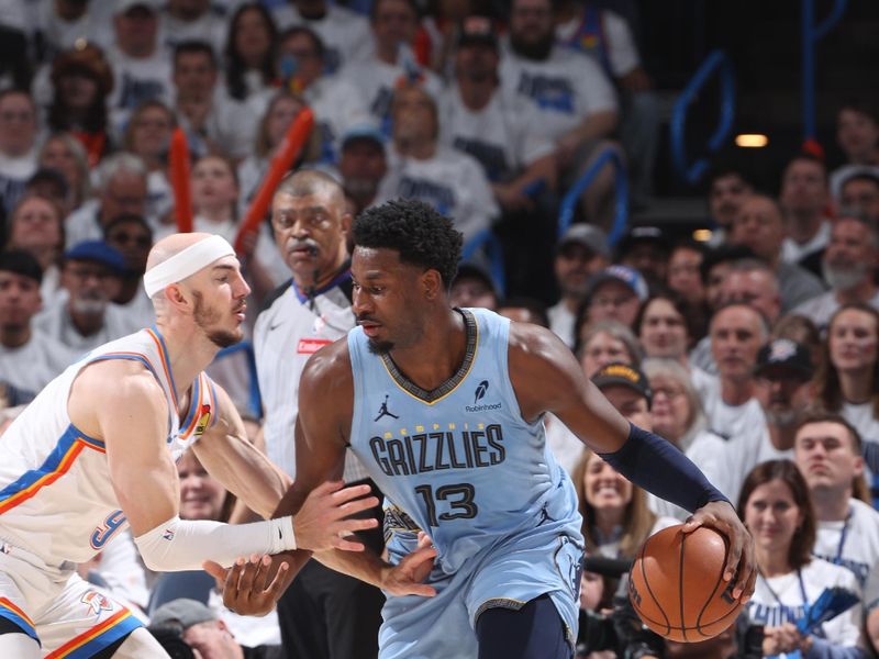 OKLAHOMA CITY, OK - APRIL 20: Jaren Jackson Jr. #13 of the Memphis Grizzlies drives to the basket during the game against the Oklahoma City Thunder during Round 1 Game 1 of the 2025 NBA Playoffs on April 20, 2025 at Paycom Center in Oklahoma City, Oklahoma. NOTE TO USER: User expressly acknowledges and agrees that, by downloading and or using this photograph, User is consenting to the terms and conditions of the Getty Images License Agreement. Mandatory Copyright Notice: Copyright 2025 NBAE (Photo by Joe Murphy/NBAE via Getty Images)