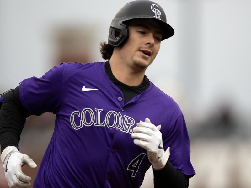 Jul 27, 2024; San Francisco, California, USA; Colorado rockies first baseman Michael Toglia (4) runs out his solo home run against the San Francisco Giants during the seventh inning at Oracle Park. Mandatory Credit: D. Ross Cameron-USA TODAY Sports