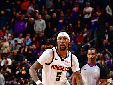 PHOENIX, AZ - DECEMBER 1: Kentavious Caldwell-Pope #5 of the Denver Nuggets dribbles the ball during the game against the Phoenix Suns on December 1, 2023 at Footprint Center in Phoenix, Arizona. NOTE TO USER: User expressly acknowledges and agrees that, by downloading and or using this photograph, user is consenting to the terms and conditions of the Getty Images License Agreement. Mandatory Copyright Notice: Copyright 2023 NBAE (Photo by Barry Gossage/NBAE via Getty Images)