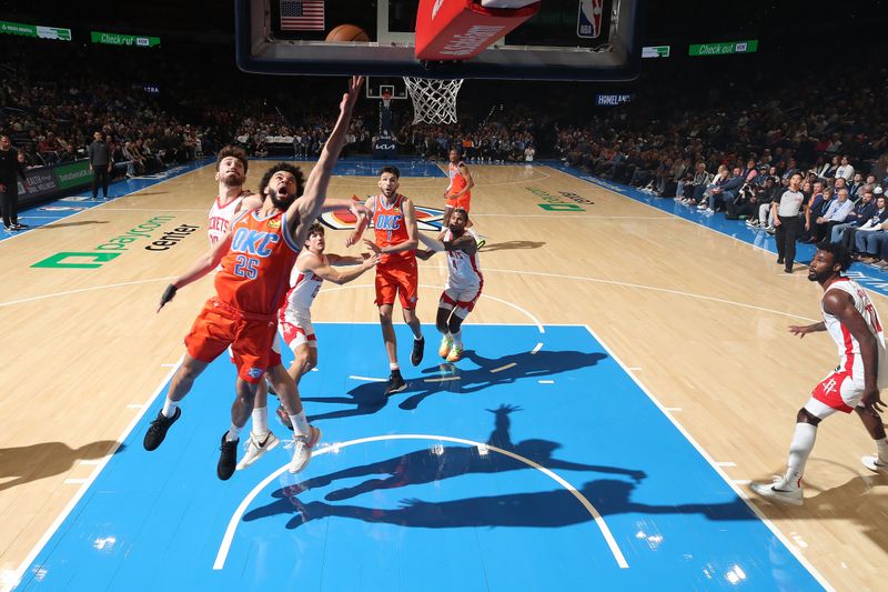 OKLAHOMA CITY, OK - NOVEMBER 8: Ajay Mitchell #25 of the Oklahoma City Thunder drives to the basket during the game against the Houston Rockets on November 8, 2024 at Paycom Center in Oklahoma City, Oklahoma. NOTE TO USER: User expressly acknowledges and agrees that, by downloading and or using this photograph, User is consenting to the terms and conditions of the Getty Images License Agreement. Mandatory Copyright Notice: Copyright 2024 NBAE (Photo by Zach Beeker/NBAE via Getty Images)