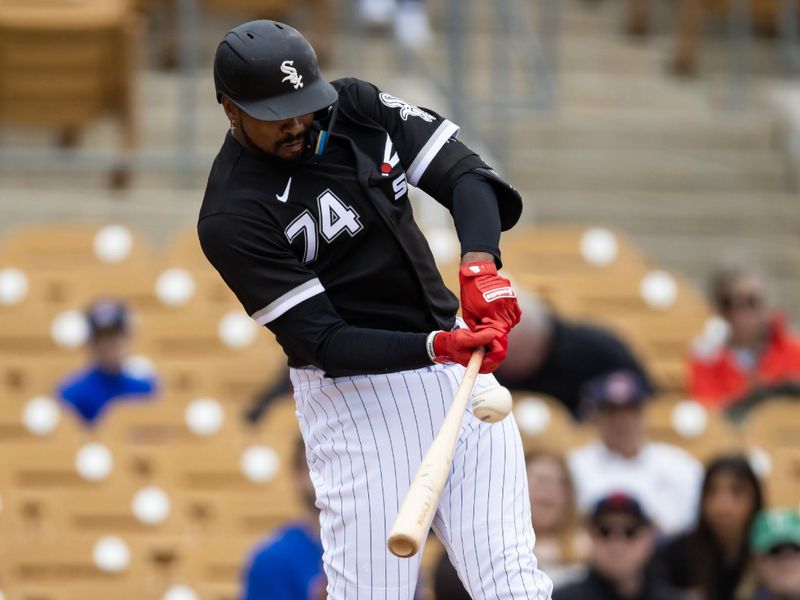 Mar 1, 2023; Phoenix, Arizona, USA; Chicago White Sox outfielder Eloy Jimenez against the Cleveland Guardians during a spring training game at Camelback Ranch-Glendale. Mandatory Credit: Mark J. Rebilas-USA TODAY Sports