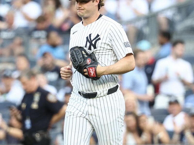 Jun 19, 2024; Bronx, New York, USA;  New York Yankees starting pitcher Gerrit Cole (45) takes the field against the Baltimore Orioles at Yankee Stadium. Mandatory Credit: Wendell Cruz-USA TODAY Sports