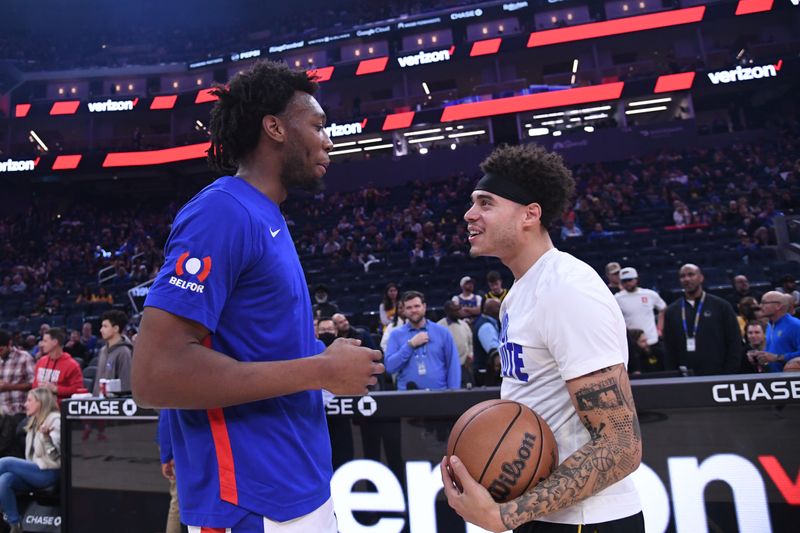 SAN FRANCISCO, CA - JANUARY 5: James Wiseman #13 of the Detroit Pistons talks to Lester Quinones #25 of the Golden State Warriors before the game on January 5, 2024 at Chase Center in San Francisco, California. NOTE TO USER: User expressly acknowledges and agrees that, by downloading and or using this photograph, user is consenting to the terms and conditions of Getty Images License Agreement. Mandatory Copyright Notice: Copyright 2024 NBAE (Photo by Noah Graham/NBAE via Getty Images)